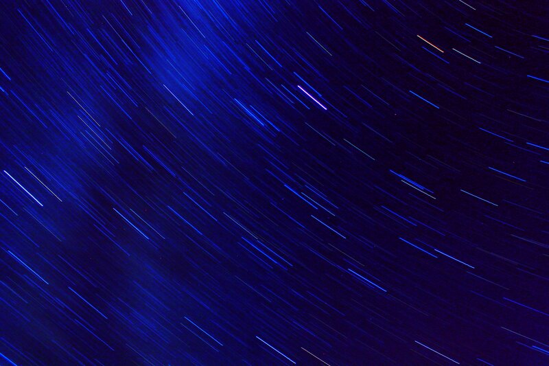 Star Trails in Night Sky — Blue, Serene, Photograph