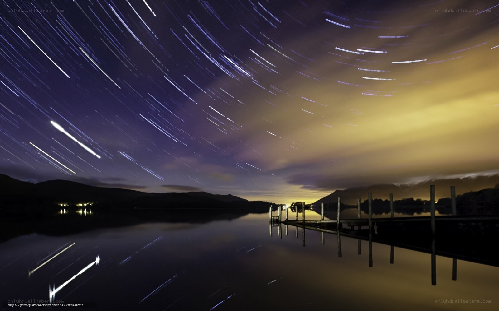 Star trails over a lake