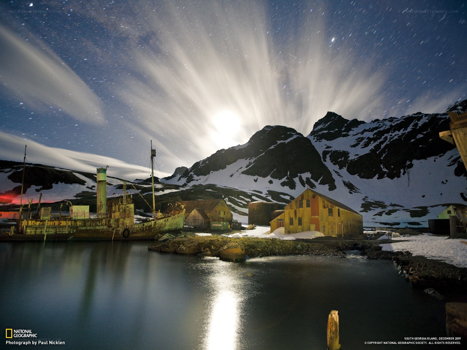 Star trails over a shipwreck