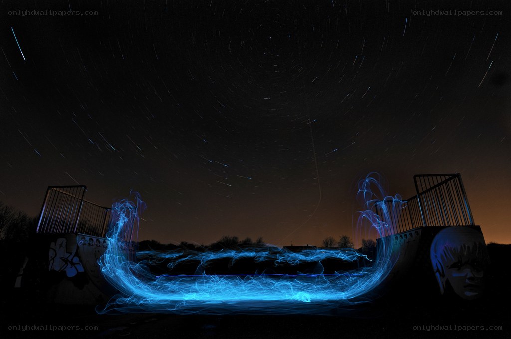 Star trails over a skatepark