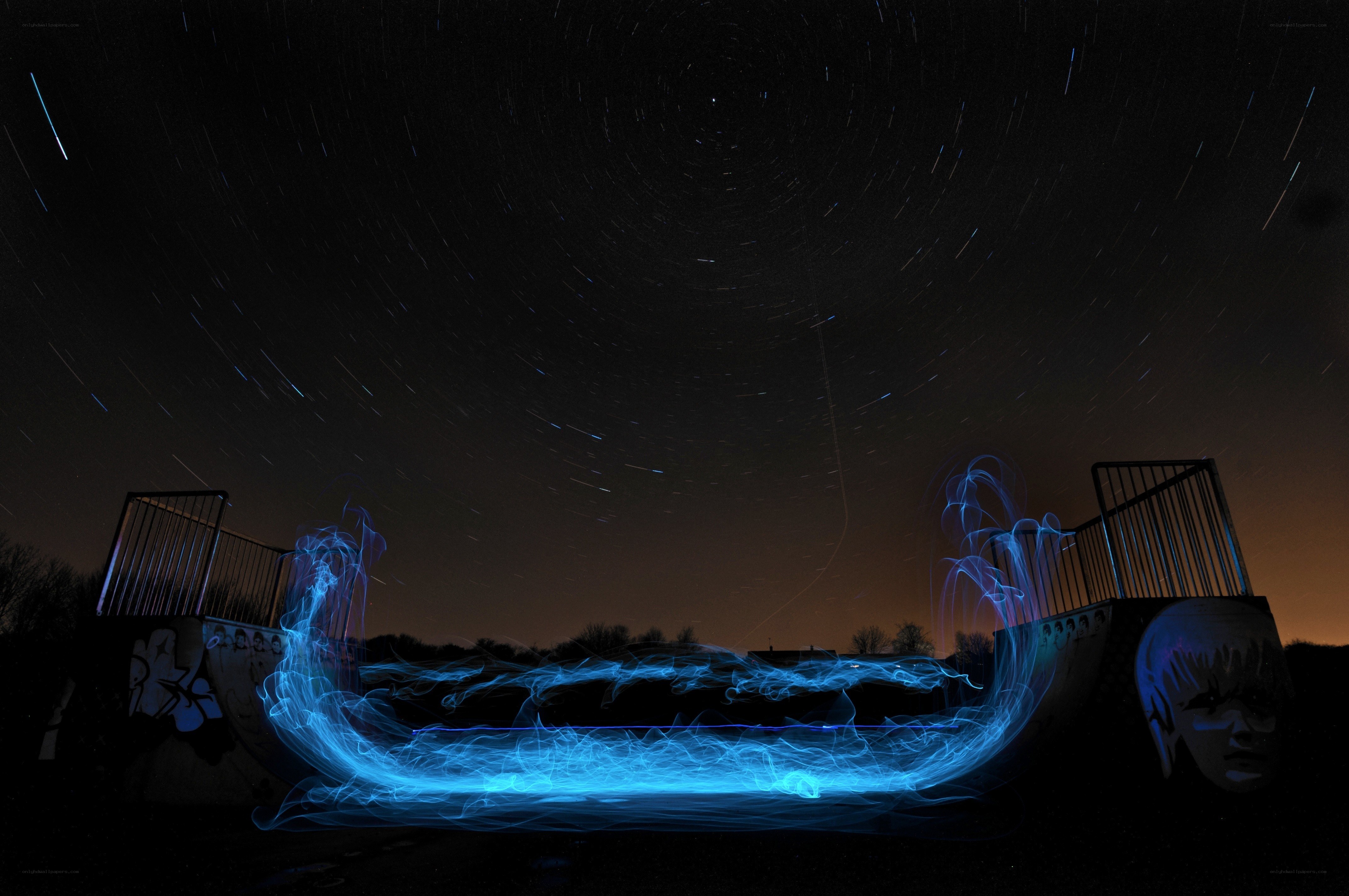 Star trails over a skatepark