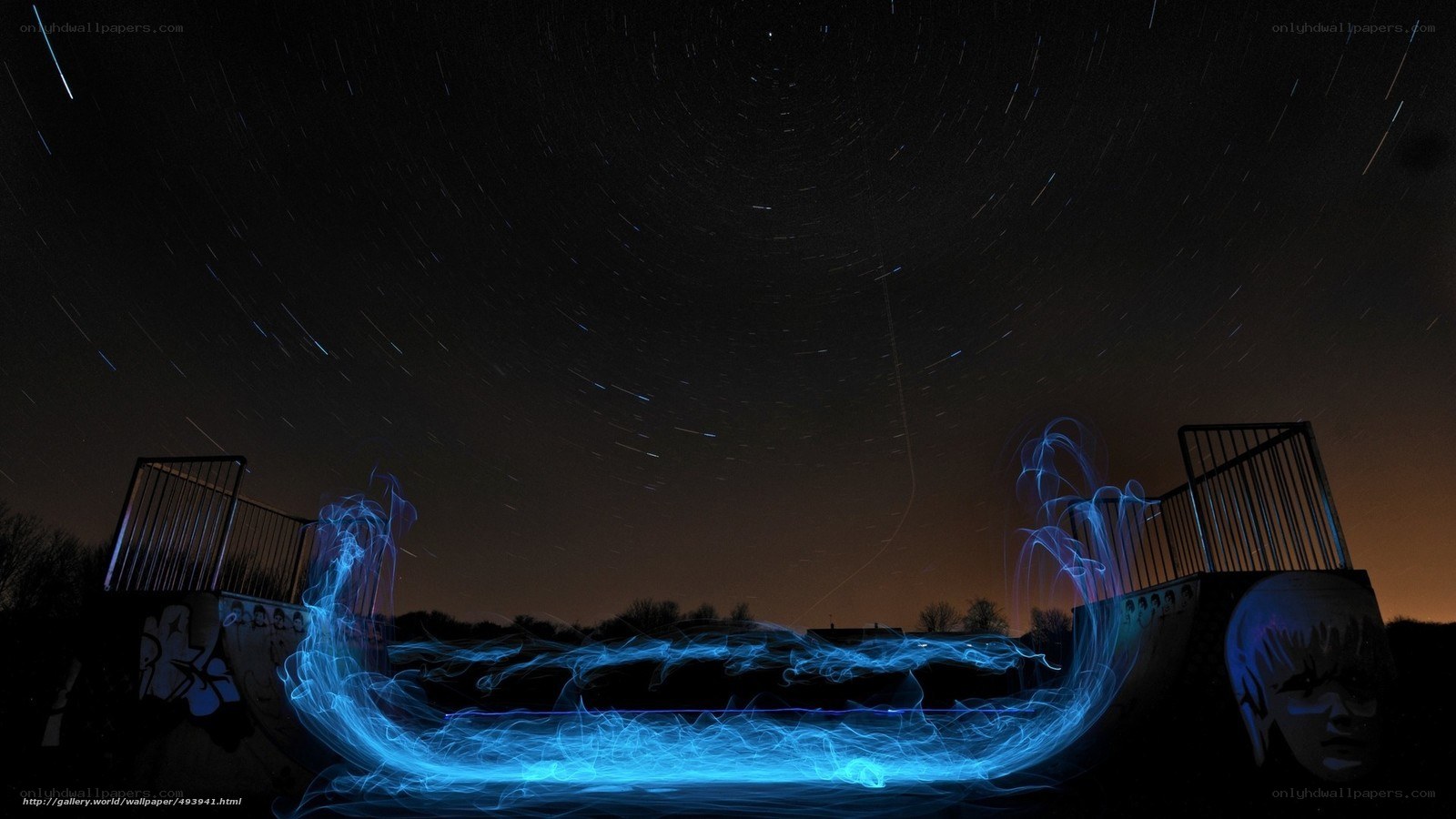 Star trails over a skatepark