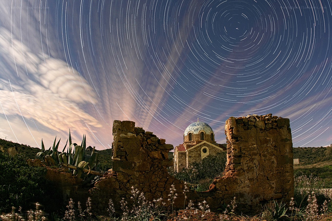 Star trails over ancient ruins