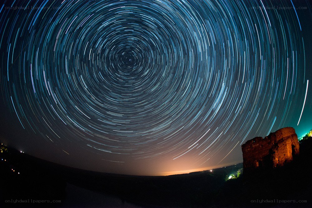 Star trails over ancient ruins