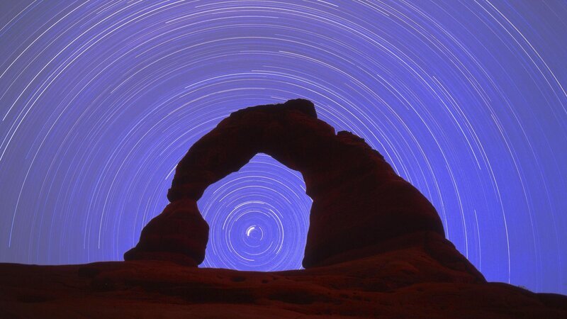 Star trails over Delicate Arch
