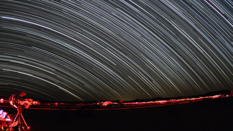Star trails over desert observatory
