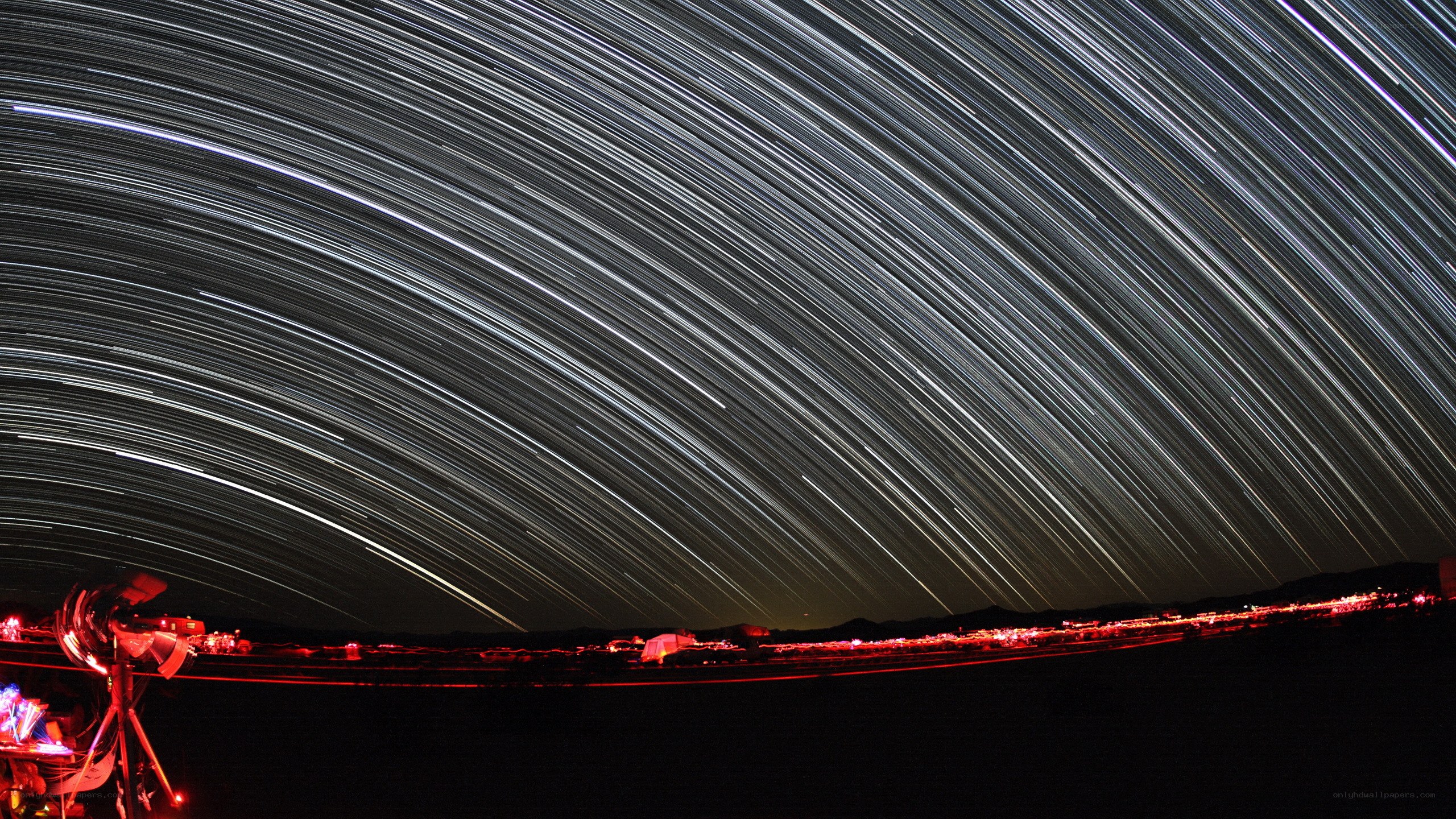Star trails over desert observatory