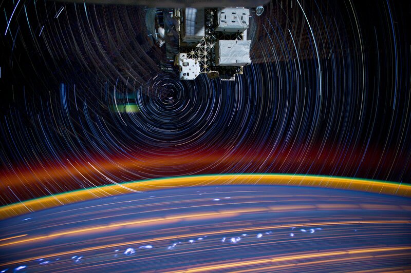Star trails over Earth from space