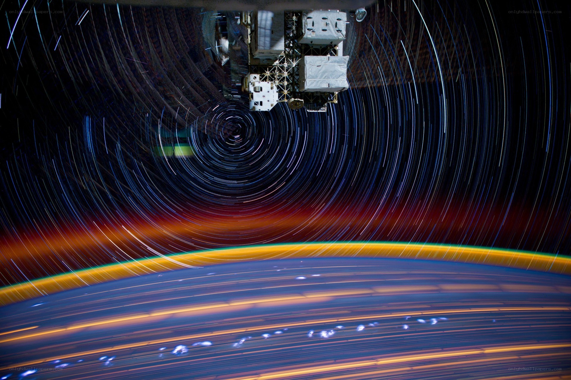 Star trails over Earth from space