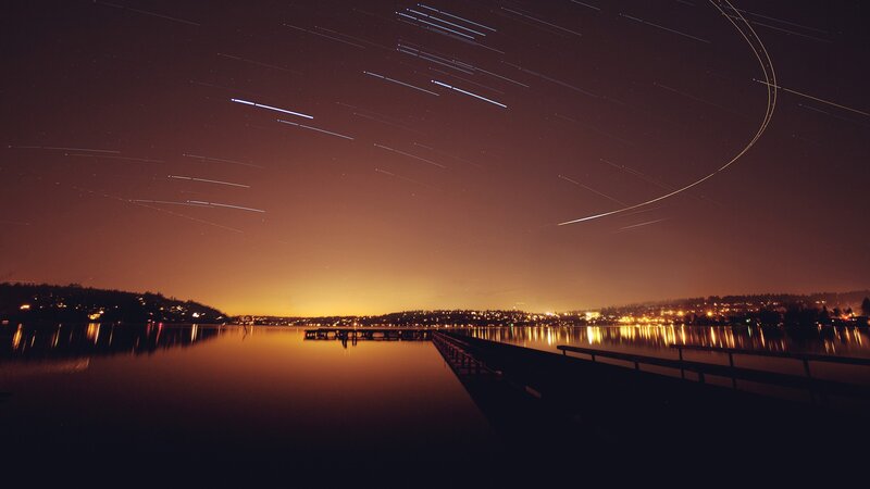 Star Trails over Lake — Orange