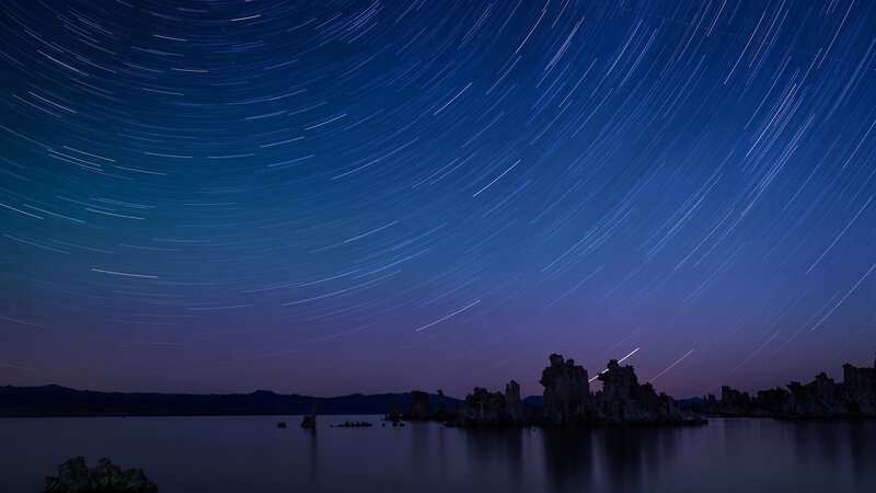 Star trails over lake tufa