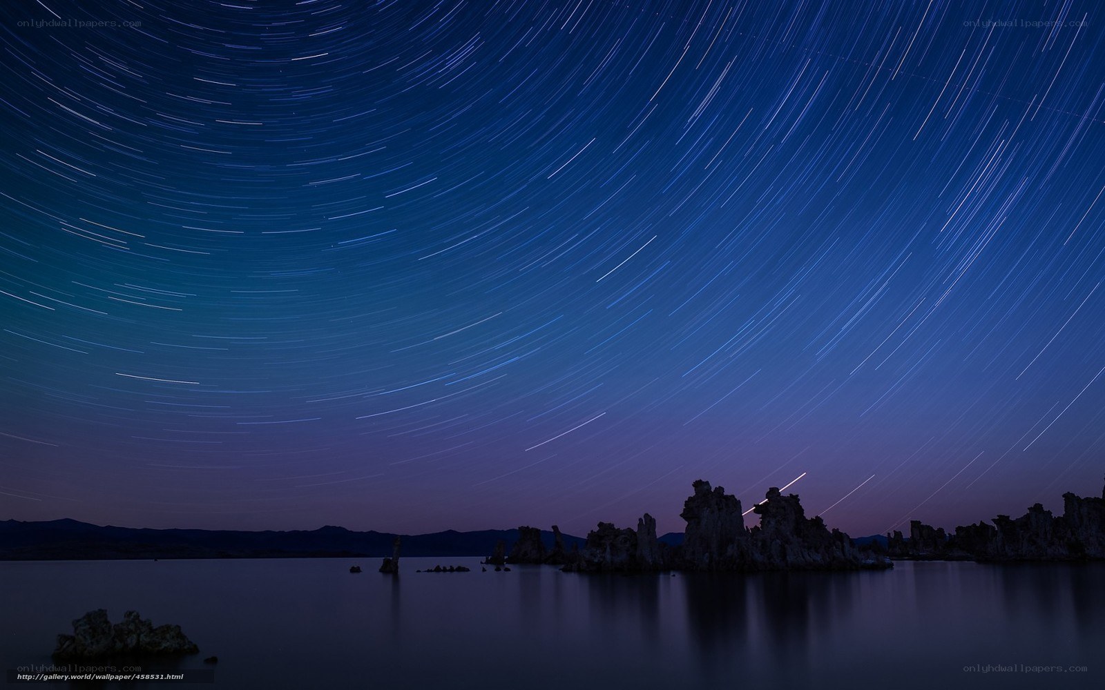 Star trails over lake tufa