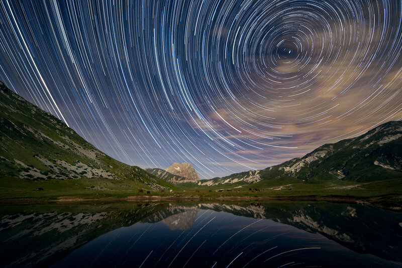 Star Trails over Mountain Lake — Blue, Serene, Night, Photograph, Mountains
