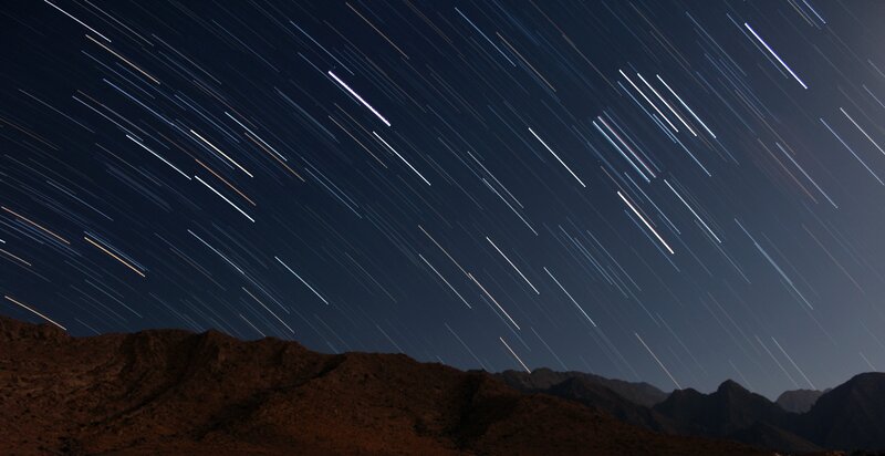 Star Trails over Mountains — Black, Serene, Night