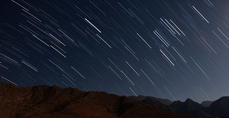 Star Trails over Mountains — Dark Blue