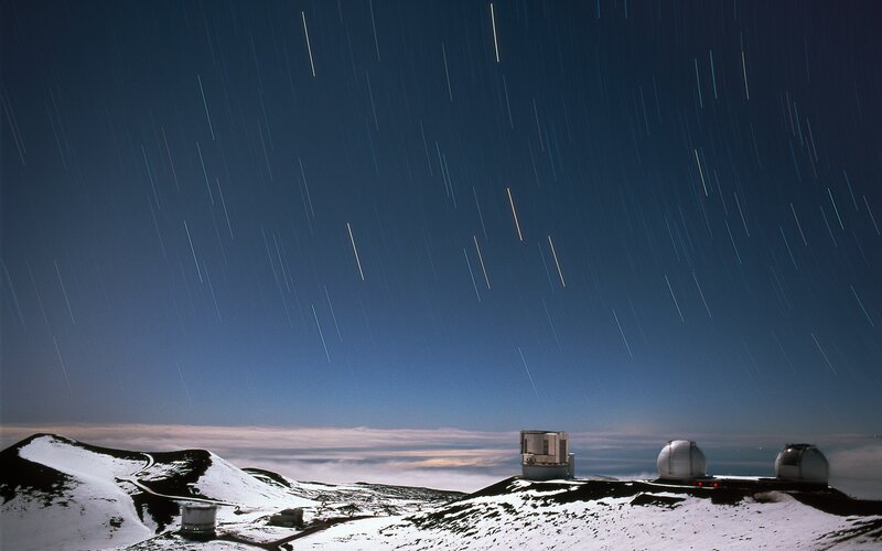 Star trails over observatory