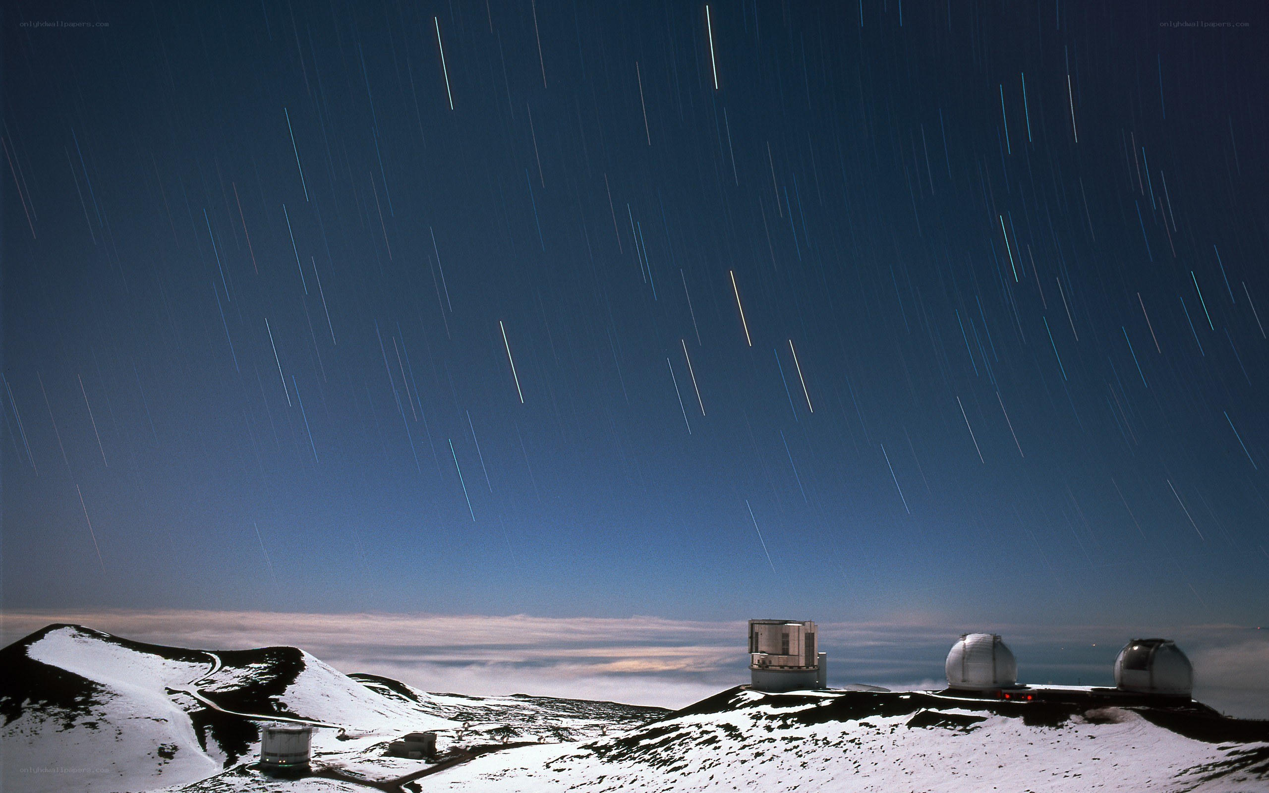 Star trails over observatory