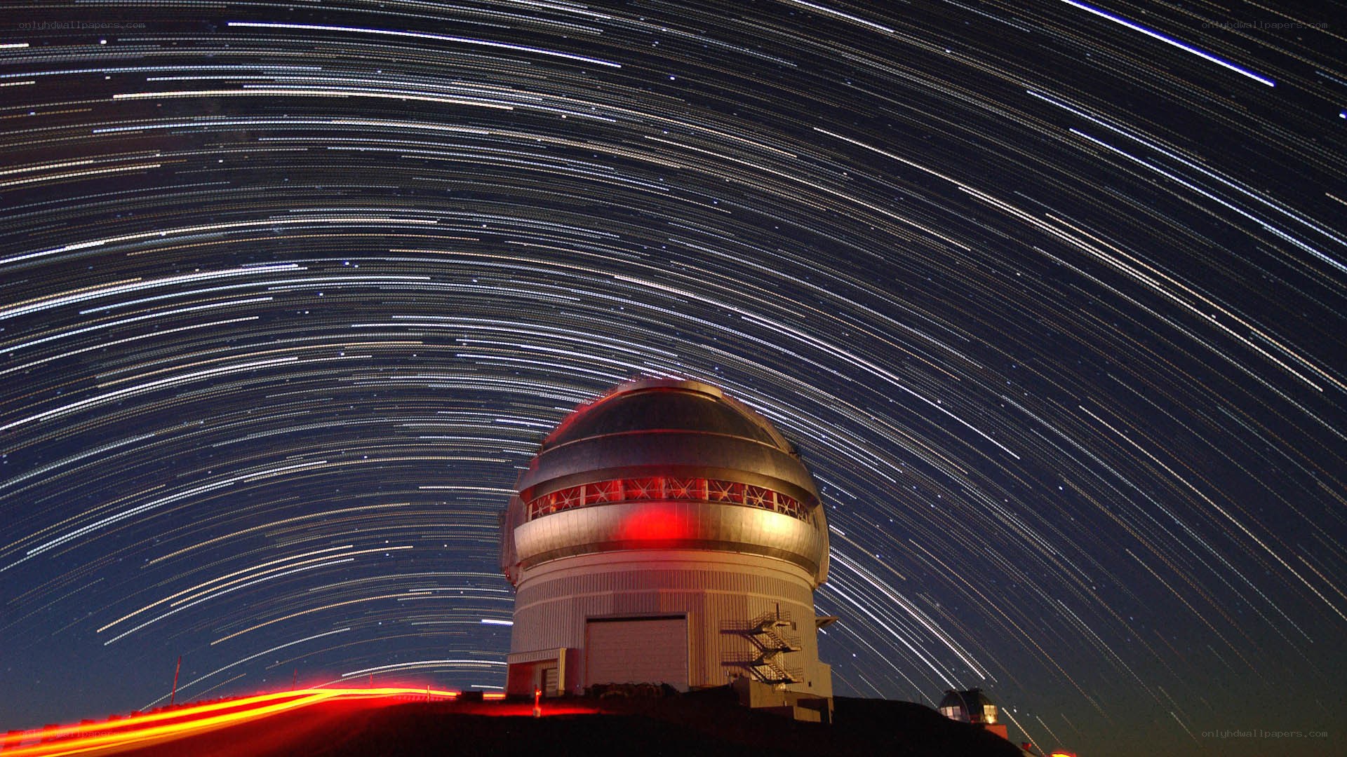 Star trails over observatory dome