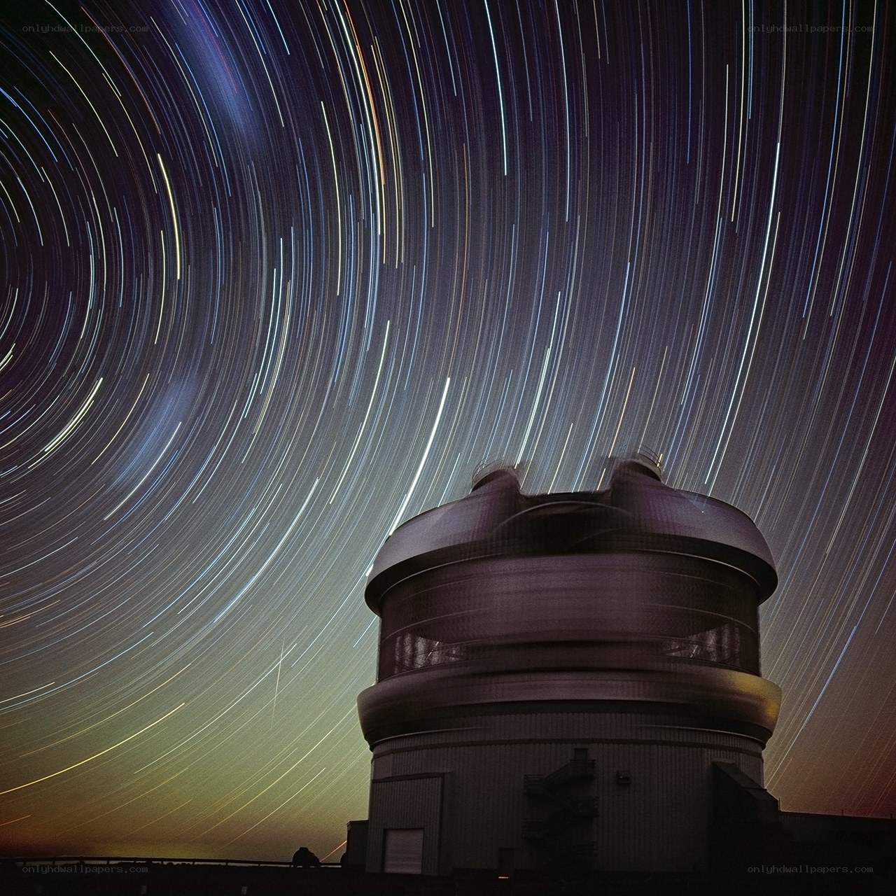 Star trails over observatory