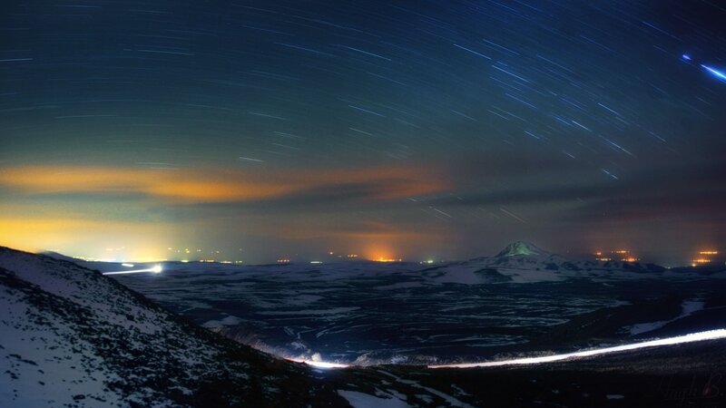 Star Trails over Snowy Mountains — Blue, Serene