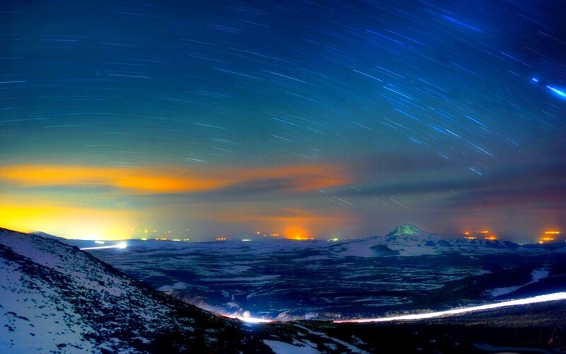 Star Trails over Snowy Mountains — Blue
