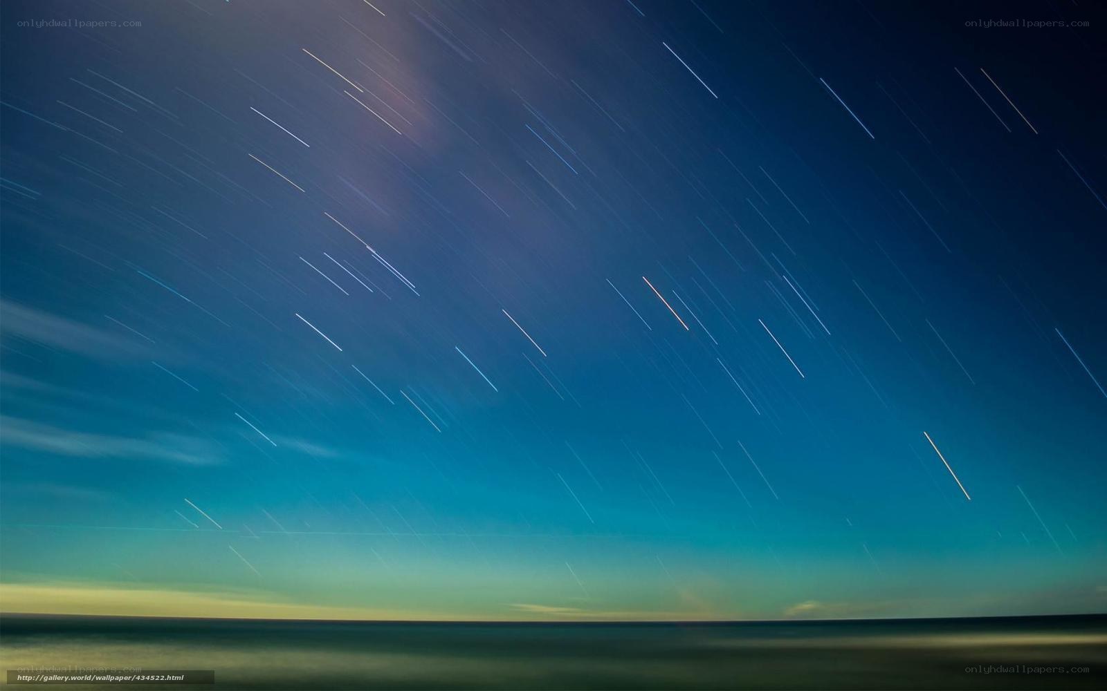 Star trails over the ocean