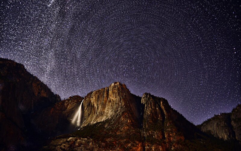 Star Trails over Waterfall — Dark Blue
