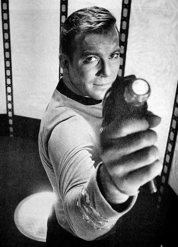 Star Trek actor holding phaser