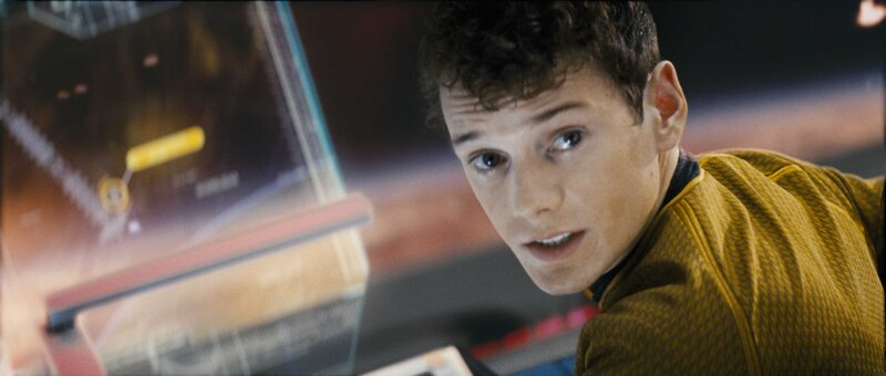 Star Trek character in yellow uniform