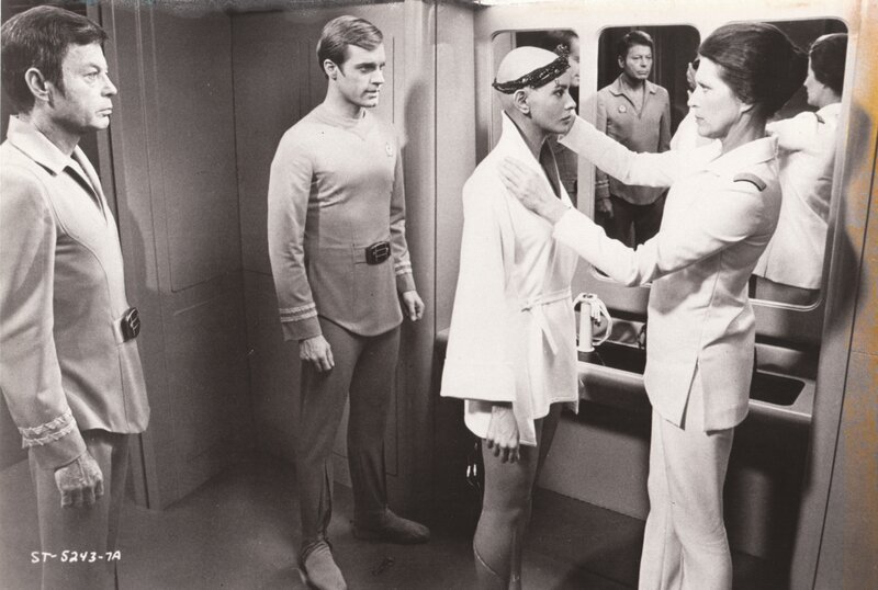 Star Trek crew in corridor