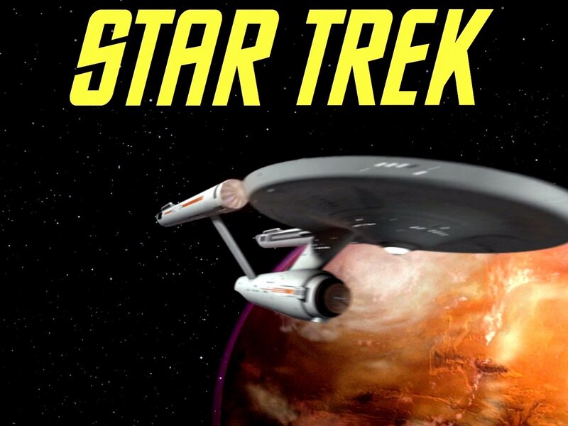 Star Trek ship near planet