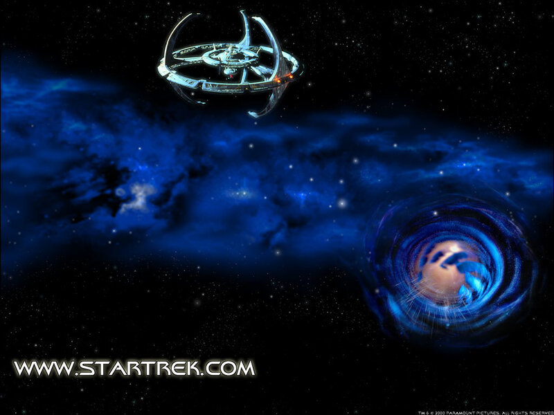 Star Trek spaceship near wormhole