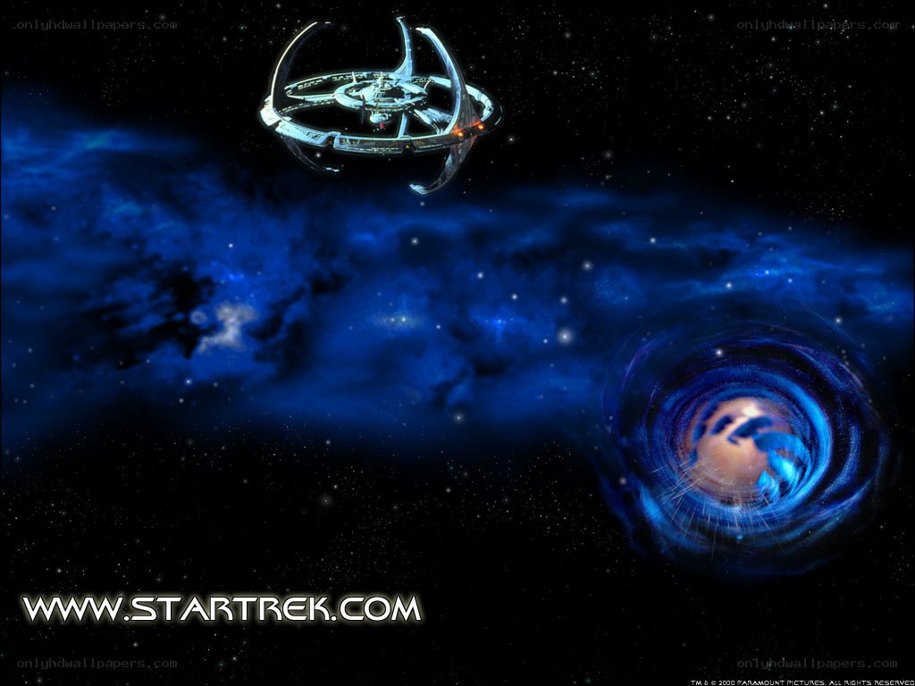 Star Trek spaceship near wormhole