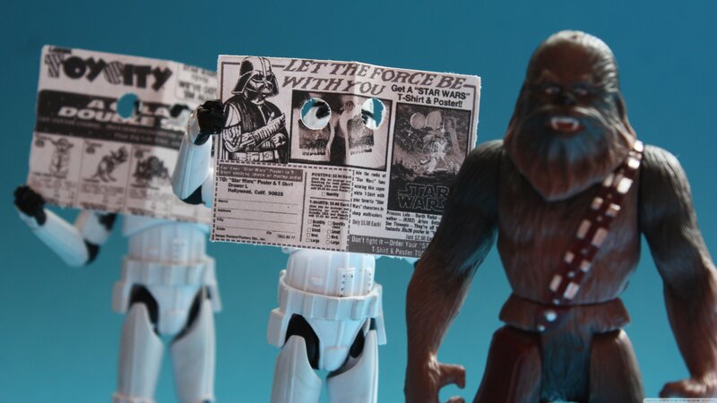 Star Wars action figures with poster