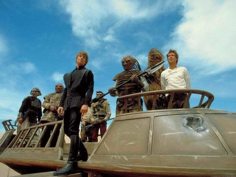 Star Wars characters on a speeder