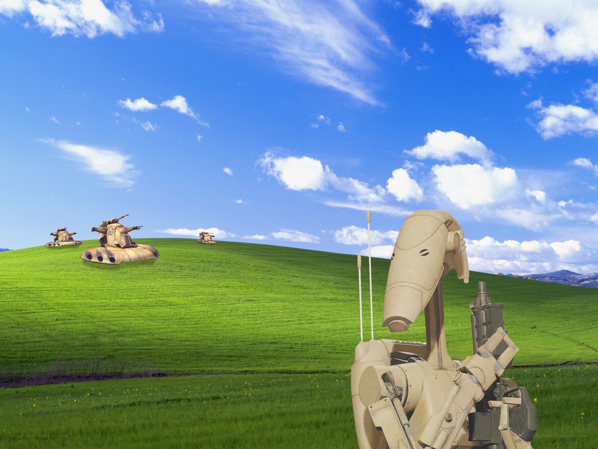 Star Wars droids on a green hill
