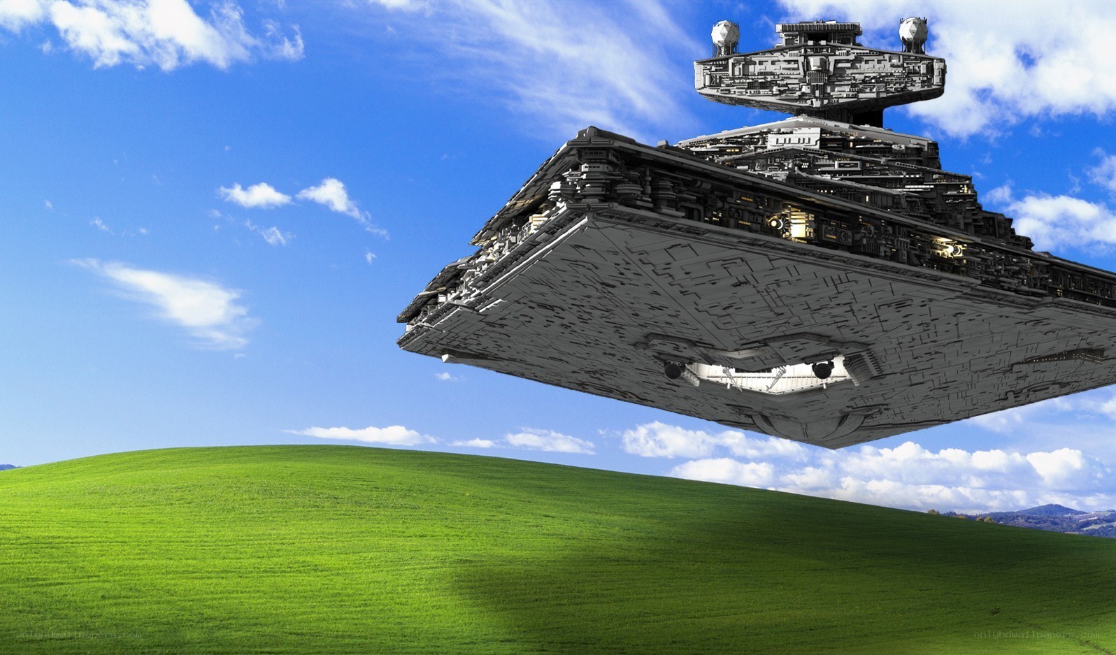 Star Wars ship over green hill