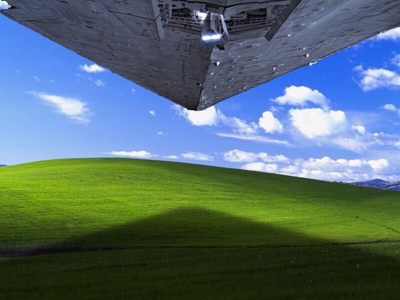 Star Wars ship over green hills