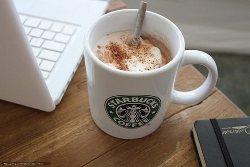 Starbucks coffee mug on desk