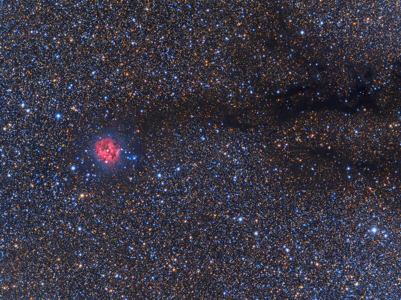 Starfield with emission nebula
