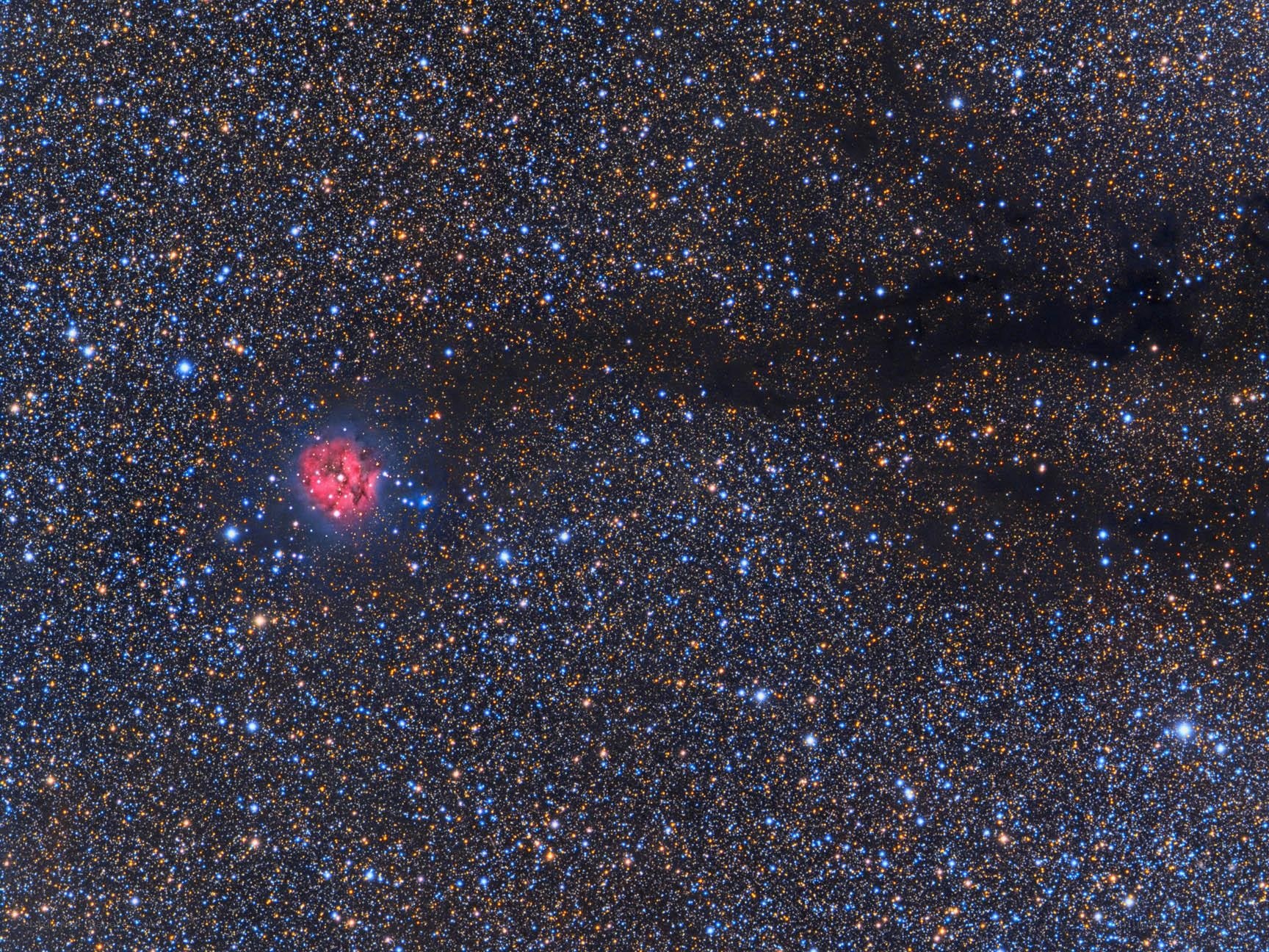 Starfield with emission nebula
