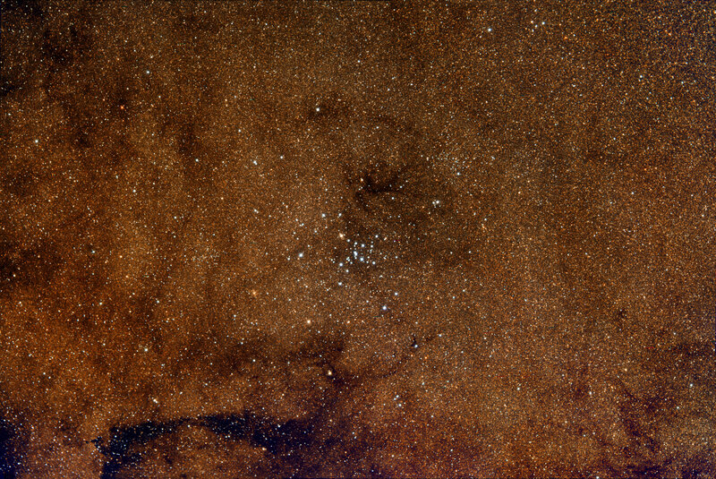 Starfield with star cluster