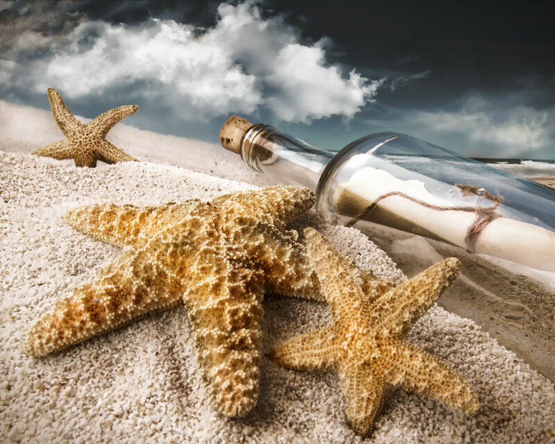 Starfish and Bottle on Beach