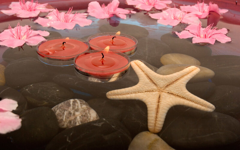Starfish and Candles in Water