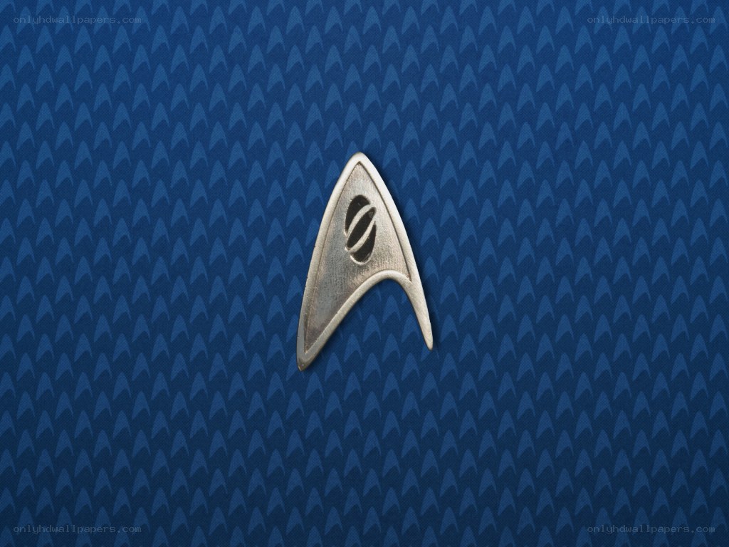 Starfleet insignia on blue background