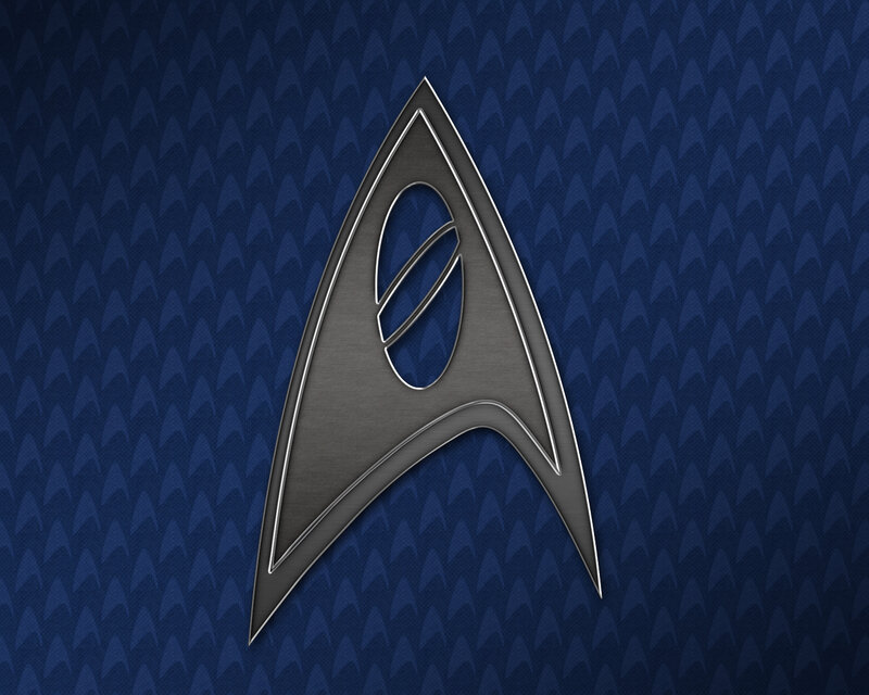 Starfleet insignia on blue background