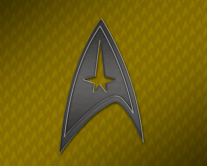 Starfleet insignia on gold background