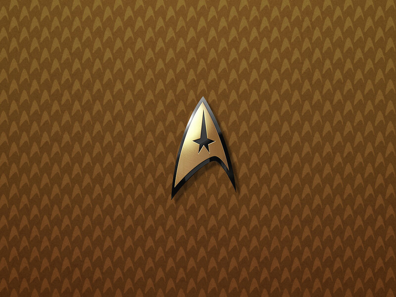 Starfleet insignia on patterned background