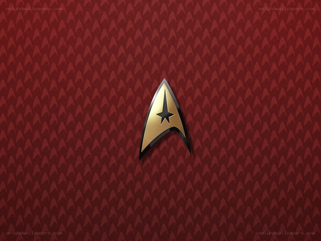 Starfleet insignia on red background