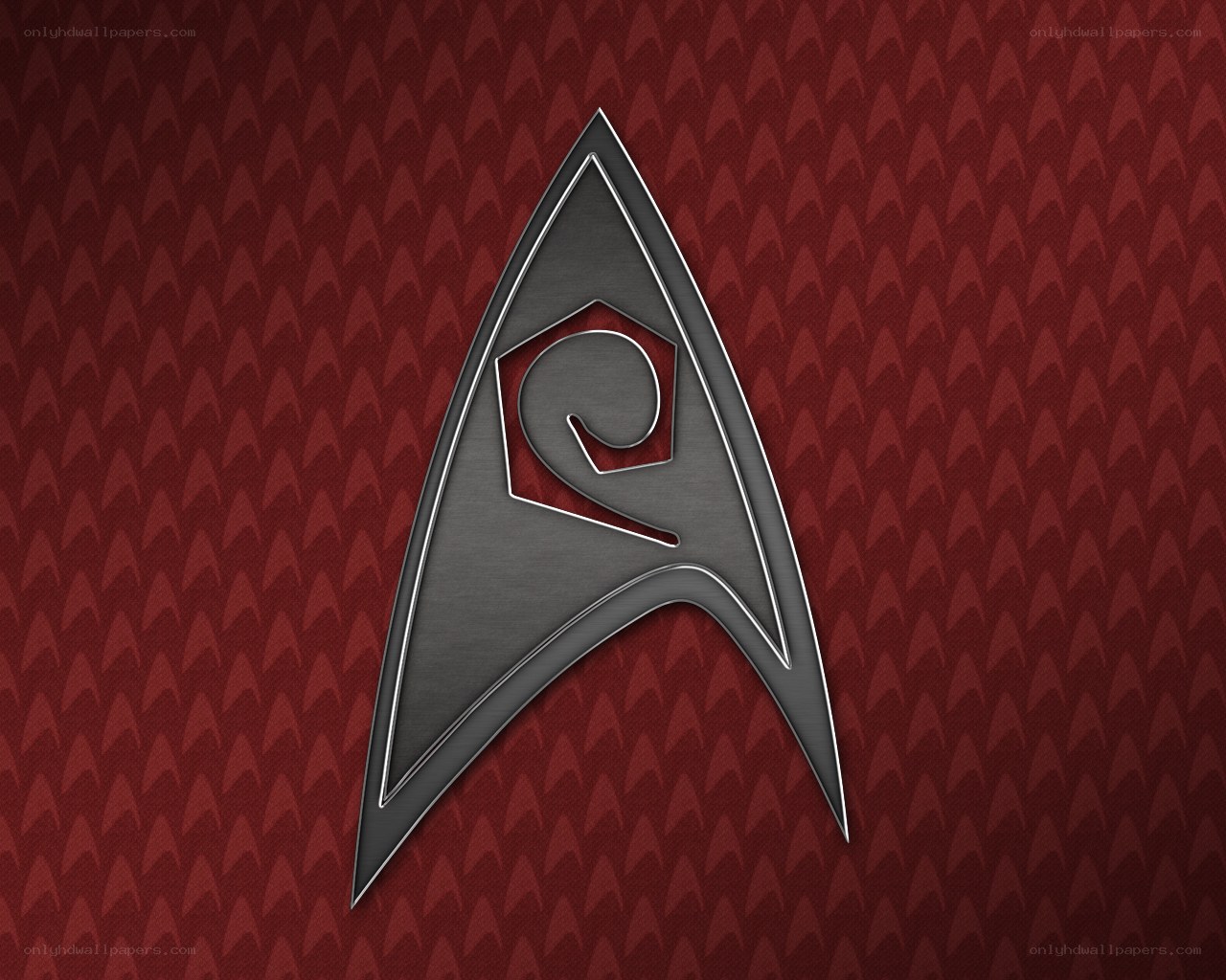 Starfleet insignia on red background